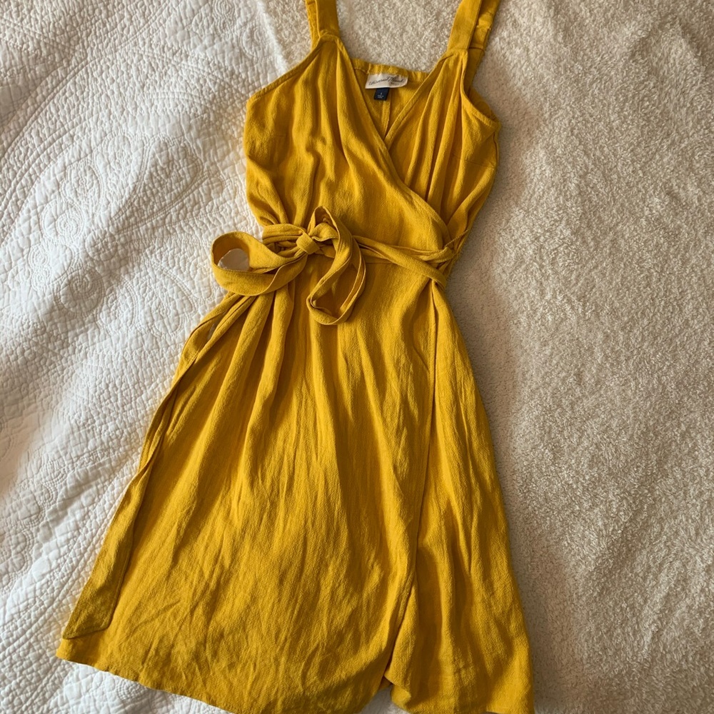 Yellow wrap tie dress